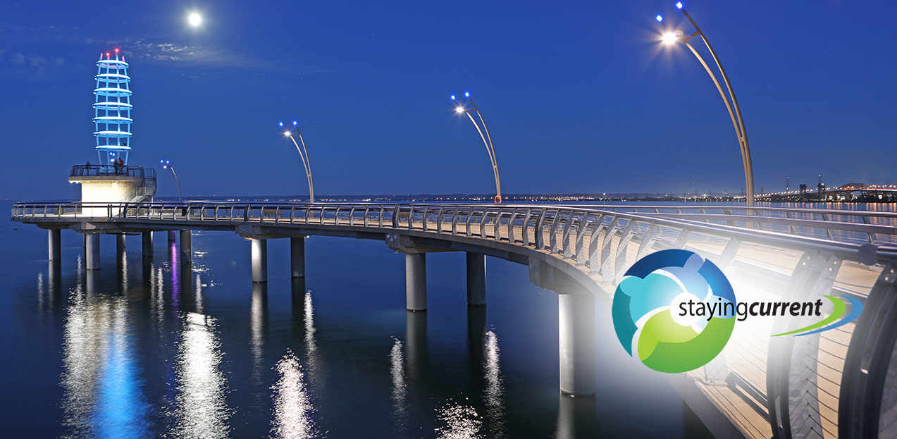 branding image, in foreground the staying current logo, in background the Burlington pier