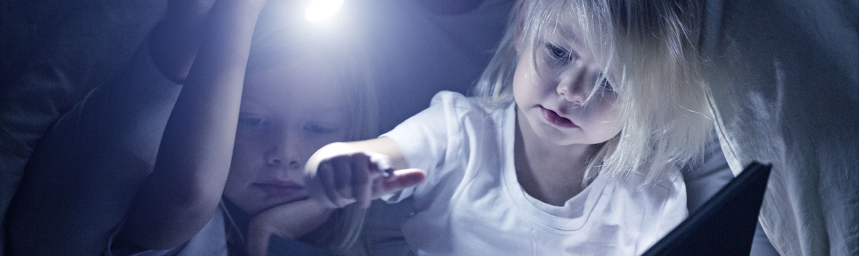 Outage Tips father with daughters during a power outage