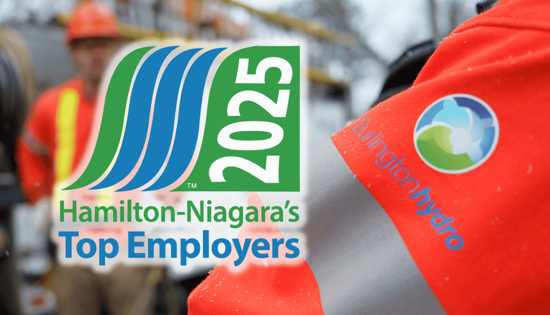 A Burlington Hydro worker in safety gear stands behind a 2025 Hamilton-Niagara's Top Employers logo.