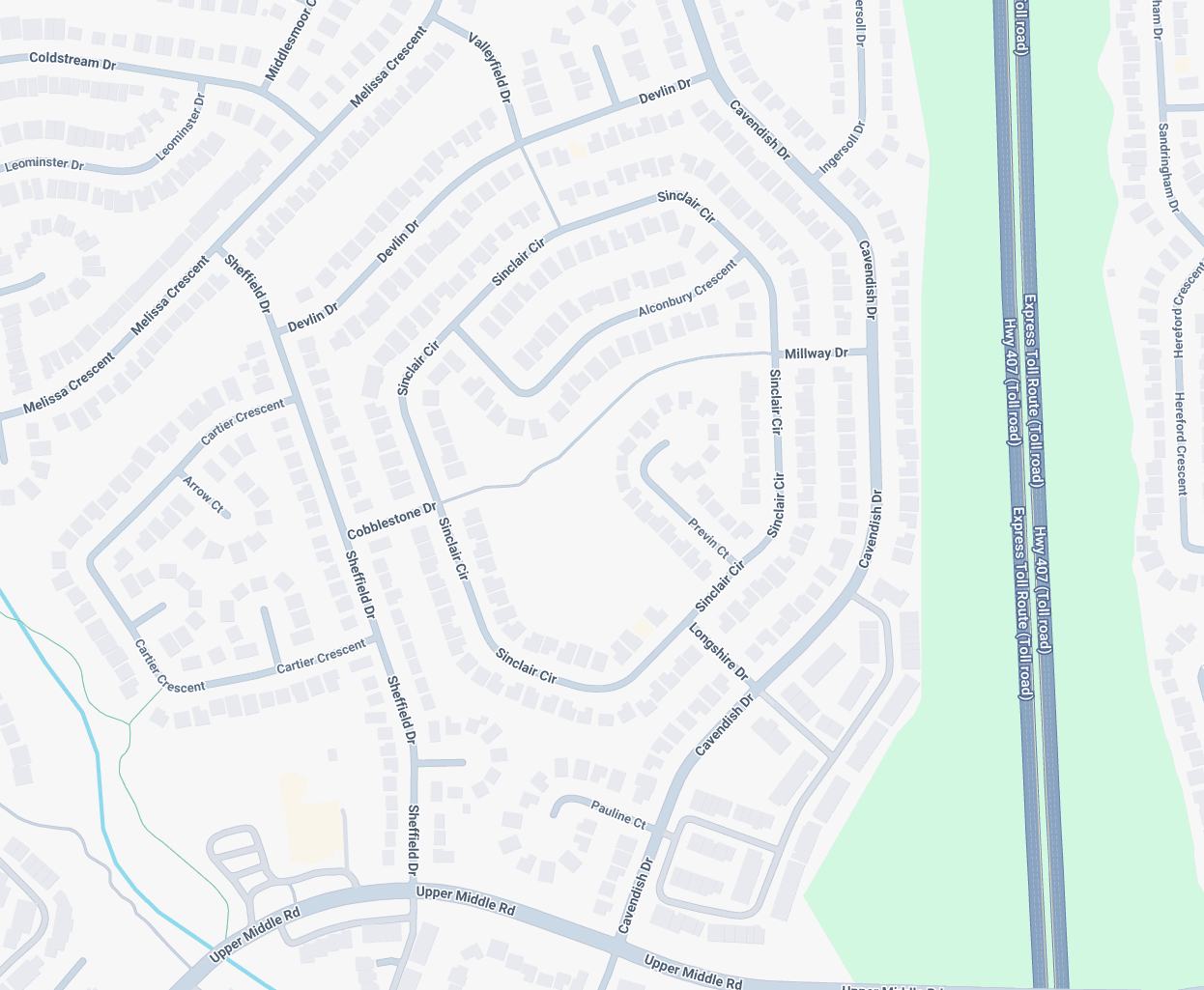A map showing a residential neighbourhood with curving roads, cul-de-sacs, and a major motorway running vertically on the right.